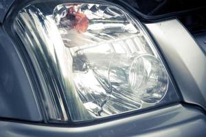 Closeup headlights of car photo