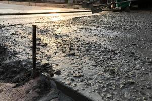 Workers pouring reinforced concrete floors on siterr photo