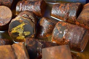 Rusty steel immersed in water photo