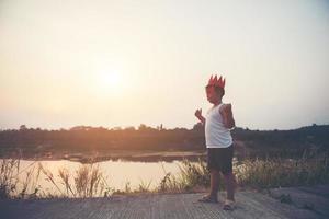 Super boy showing his powerful flying arms photo