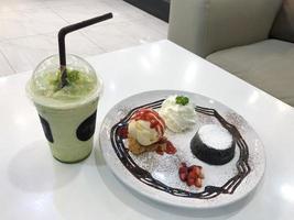 Plate of desserts with a drink photo