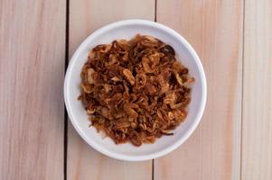 A bowl of fried onions photo