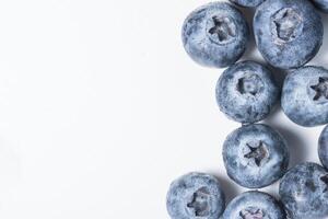 Blueberries on white background photo