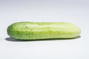 Cucumber on white background photo