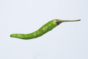 Green peppers on white background photo