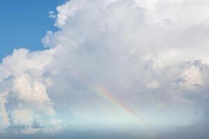 Clouds in the sky with rainbow photo