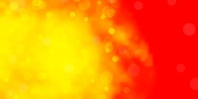 Light Red, Yellow vector backdrop with dots.