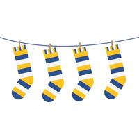 socks with colored stripes hanging on line vector