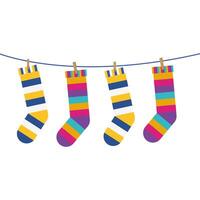 socks with colored stripes hanging on line vector