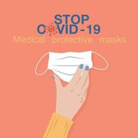Hand holding face mask stop covid-19 concept vector
