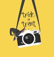 vintage camera hanging with witch hat for Halloween vector