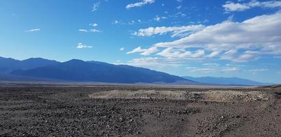 Blue sky over mountains photo