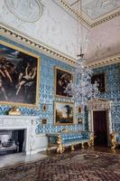 Kedleston Hall, UK, 2020 - Glass chandelier near wall photo