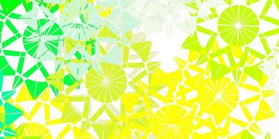 Light green, yellow vector pattern with colored snowflakes.