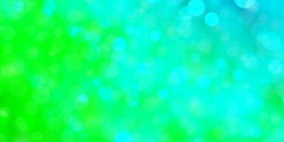 Light Blue, Green vector background with circles.