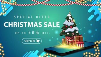 Special offer, Christmas sale, up to 50 off, blue discount banner for website with garlands, button and smartphone from the screen which appear Christmas tree in a pot with gifts vector