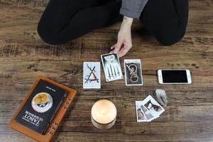 Tarot cards and a candle photo