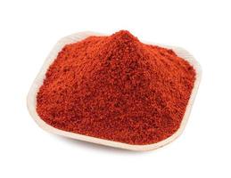 Red Chilli Pepper Powder on White Background photo