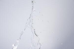 Water over grey background photo