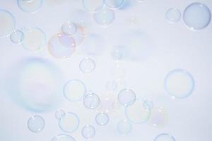 Bubbles in front of greyish-white background photo