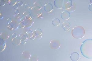 Bubbles in front of greyish-white background photo