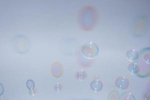 Bubbles in front of greyish-white background photo