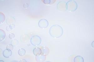 Bubbles in front of greyish-white background photo