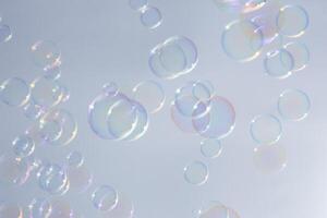 Bubbles in front of greyish-white background photo