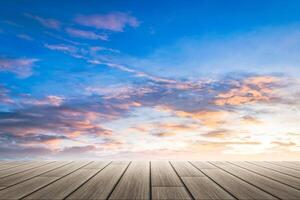 Sky background behind wooden floor plates photo