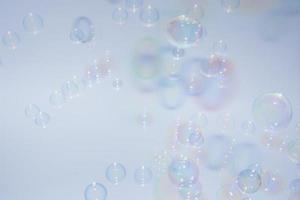 Bubbles in front of greyish-white background photo