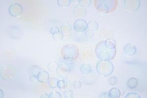 Bubbles in front of greyish-white background photo