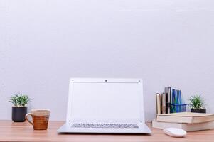 Notebook computer on the desk photo
