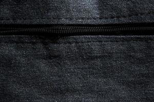Dark cotton denim background photo
