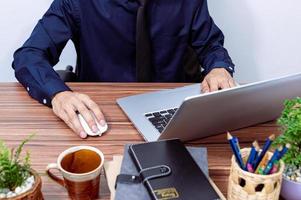 Businessman working at his desk photo