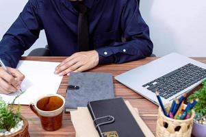 Businessman working at his desk photo