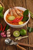 Hot and spicy tom yum kung Thai soup photo