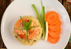 Shrimp fried rice on a white platter photo