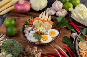 Noodles with squid and boiled egg photo