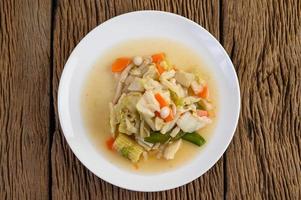 Stir-fry mixed vegetables on a white plate photo