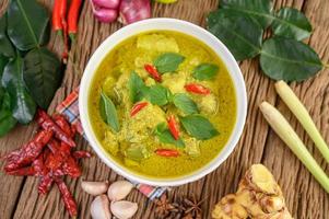 Green curry with limes, red onion, lemon grass, garlic and kaffir leaves photo