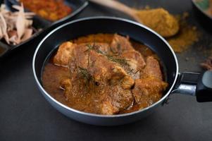 Massaman curry with traditional spices photo