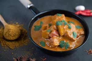 Massaman curry with traditional spices photo