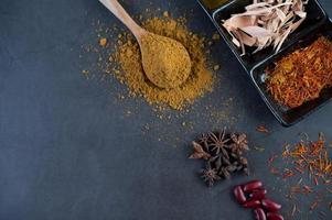 Spices on a gray kitchen surface photo
