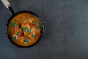 Fresh massaman curry in a frying pan photo