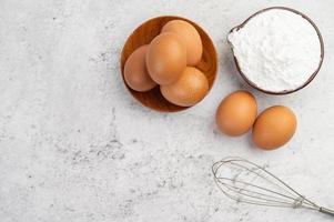 Eggs, tapioca flour and and egg beater photo