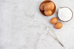 Eggs, tapioca flour and and egg beater photo