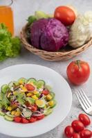 A plated salad with vegetables photo