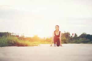 Young athlete ready to start run photo