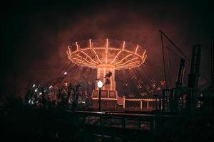 Carousel in the amusement park photo