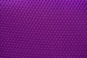 Violet nylon fabric textured background with hexagonal shape photo